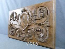 Carved Oak Bas-Relief of Renaissance Style with Scrollwork and Heads