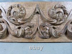 Carved Oak Bas-relief in Renaissance Style with 4 Heads and Scrollwork Decoration