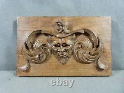 Carved oak bas-relief in Renaissance style with Devil head decor