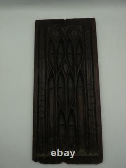 Carved oak wood panel, probably from the High Gothic period