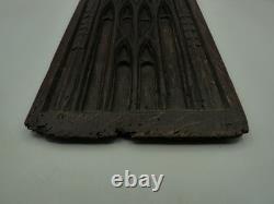 Carved oak wood panel, probably from the High Gothic period