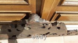 Carved wooden pediment with griffin decoration, late 19th to early 20th century