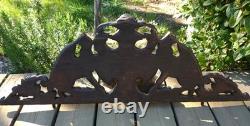 Carved wooden pediment with griffin decoration, late 19th to early 20th century