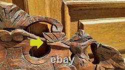 Carved wooden pediment with griffin decoration, late 19th to early 20th century