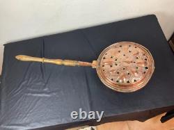 Copper bed warmer with fleur-de-lis, 18th century