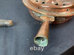 Copper bed warmer with fleur-de-lis, 18th century