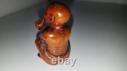 Curious Netsuke signed Japan man smoking pipe wood (3)