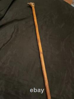 Dandy cane with ball-shaped handle