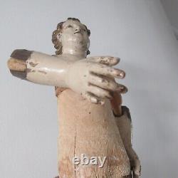 Eighteenth century nativity scene character in wood 42 cm with attached torso and legs. Santon