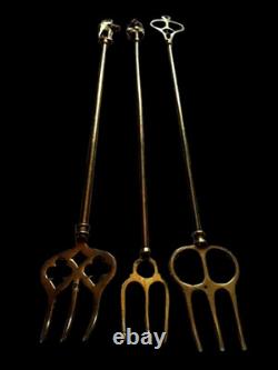 Elegant Danish fireplace accessory trio, gilded brass, late 19th century