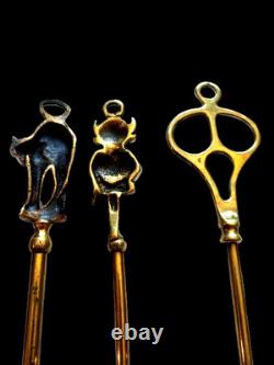 Elegant Danish fireplace accessory trio, gilded brass, late 19th century