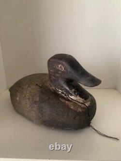 Hunting fishing folk art. Vintage wooden duck decoy call.