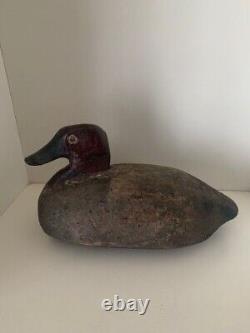 Hunting fishing folk art. Vintage wooden duck decoy call.