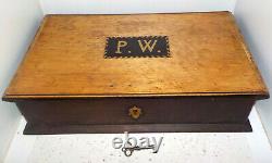 Large 19th century wooden box with monogrammed P. W. Cartouche and Key