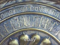 Large brass offering dish, 17th century