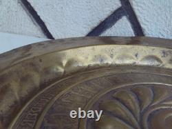 Large brass offering dish, 17th century