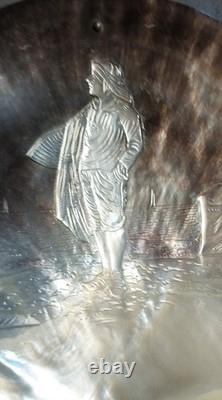 Large carved mother-of-pearl shell