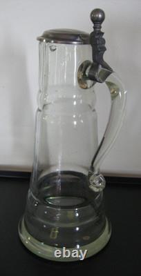 Large covered pitcher in blown glass, 19th century, slightly bubbled antique glass