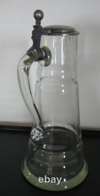 Large covered pitcher in blown glass, 19th century, slightly bubbled antique glass