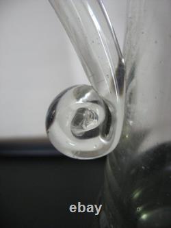 Large covered pitcher in blown glass, 19th century, slightly bubbled antique glass