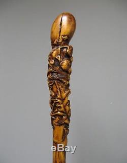 Old Wooden Carved Walking Stick. Thistles. Folk Art