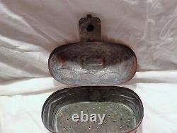 Old basket or vintage copper fish reserve tank for fishing in the mid-20th century