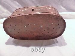 Old basket or vintage copper fish reserve tank for fishing in the mid-20th century