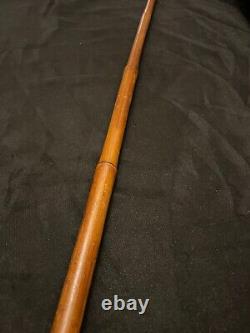 Old cane. Corkscrew