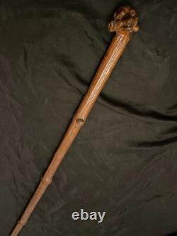 Old cane, grotesque folk art