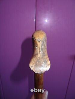 Old carved wooden folk art cane