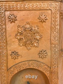 Old ceramic water fountain, terracotta, crafted in the 19th century, popular art