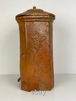 Old ceramic water fountain, terracotta, crafted in the 19th century, popular art