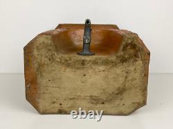 Old ceramic water fountain, terracotta, crafted in the 19th century, popular art