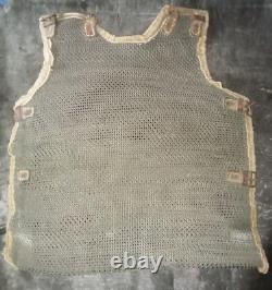 Old chainmail chest plate + damaged leather back straps