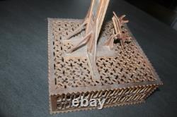 Old cut-out wooden toy guillotine