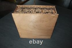 Old cut-out wooden toy guillotine