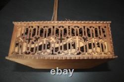 Old cut-out wooden toy guillotine