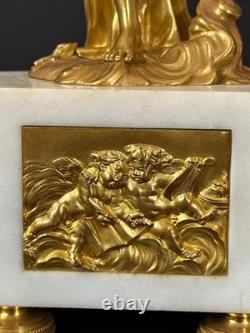 Old pair of gilt bronze candlesticks with female figure and cornucopia, 19th century
