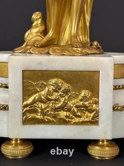 Old pair of gilt bronze candlesticks with female figure and cornucopia, 19th century