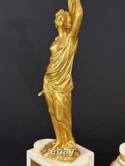 Old pair of gilt bronze candlesticks with female figure and cornucopia, 19th century
