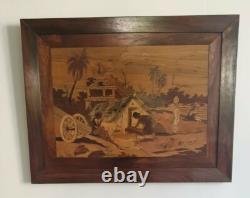 Old wooden marquetry painting of an Indian village, exotic beach, animals