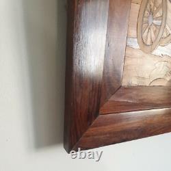 Old wooden marquetry painting of an Indian village, exotic beach, animals
