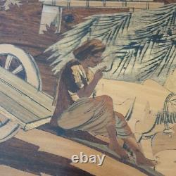 Old wooden marquetry painting of an Indian village, exotic beach, animals