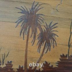 Old wooden marquetry painting of an Indian village, exotic beach, animals