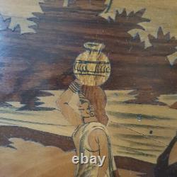 Old wooden marquetry painting of an Indian village, exotic beach, animals