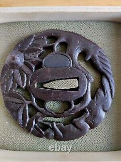 Openwork Japanese Edo period antique iron tsuba with monkey decoration in a tree