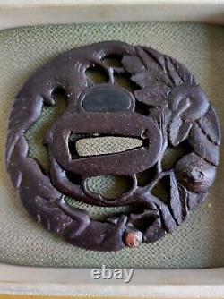 Openwork Japanese Edo period antique iron tsuba with monkey decoration in a tree