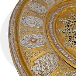 Ottoman basin in chased brass, inlaid with silver and copper Syria, late 19th century