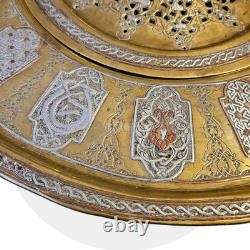 Ottoman basin in chased brass, inlaid with silver and copper Syria, late 19th century