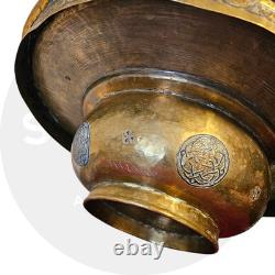 Ottoman basin in chased brass, inlaid with silver and copper Syria, late 19th century